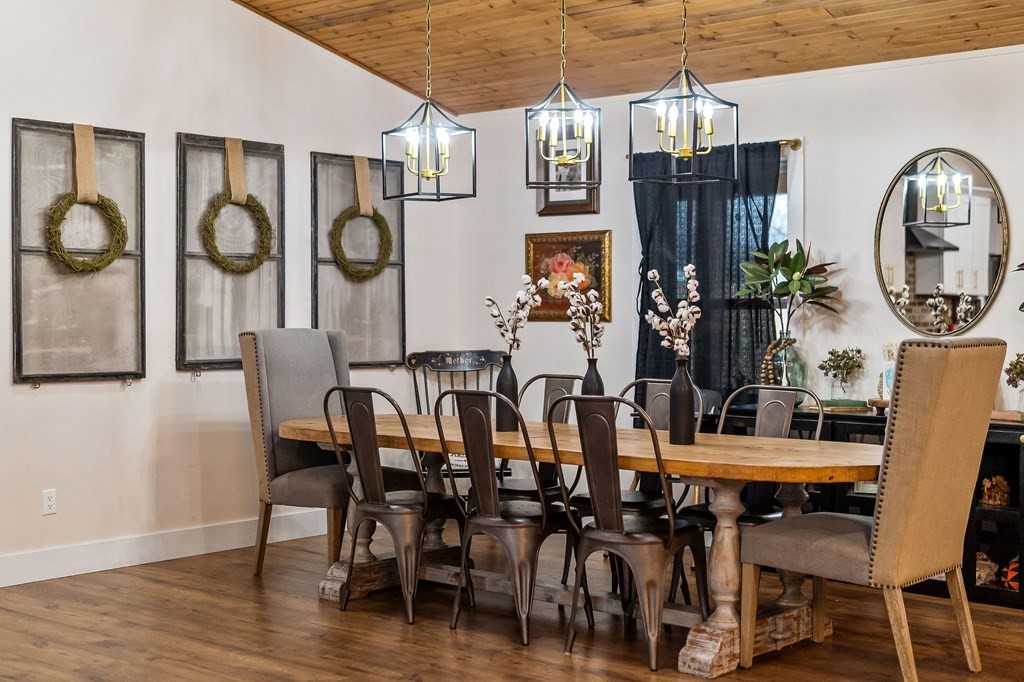 240 Bob Ledbetter Road Livingston, TN 38570 - Photo 12 of 62 a view of a dining room with furniture window and wooden floor