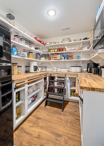 a utility room with sink dryer and washer
