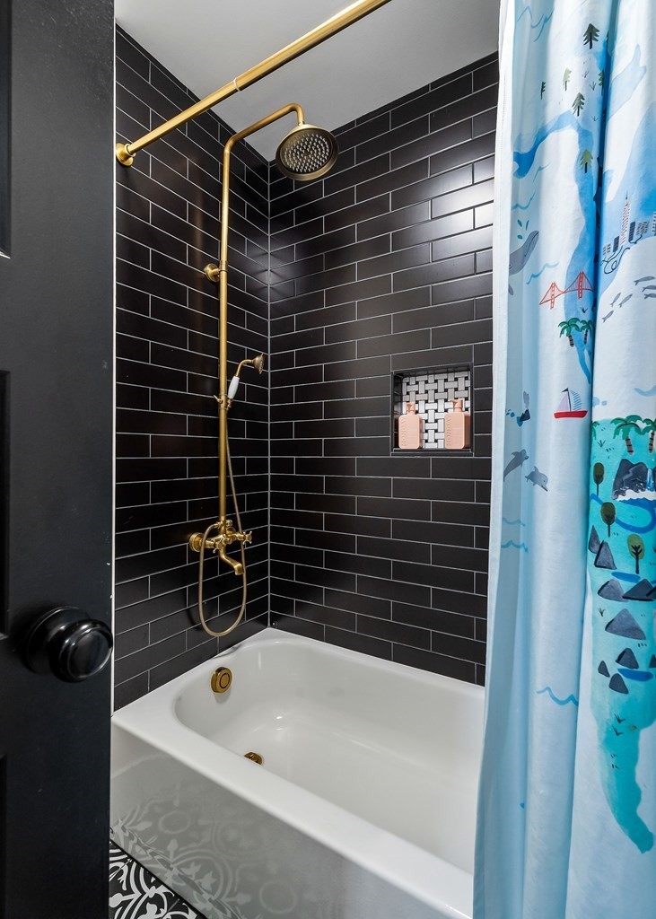 240 Bob Ledbetter Road Livingston, TN 38570 - Photo 37 of 62 a bathroom with a shower and a bathtub