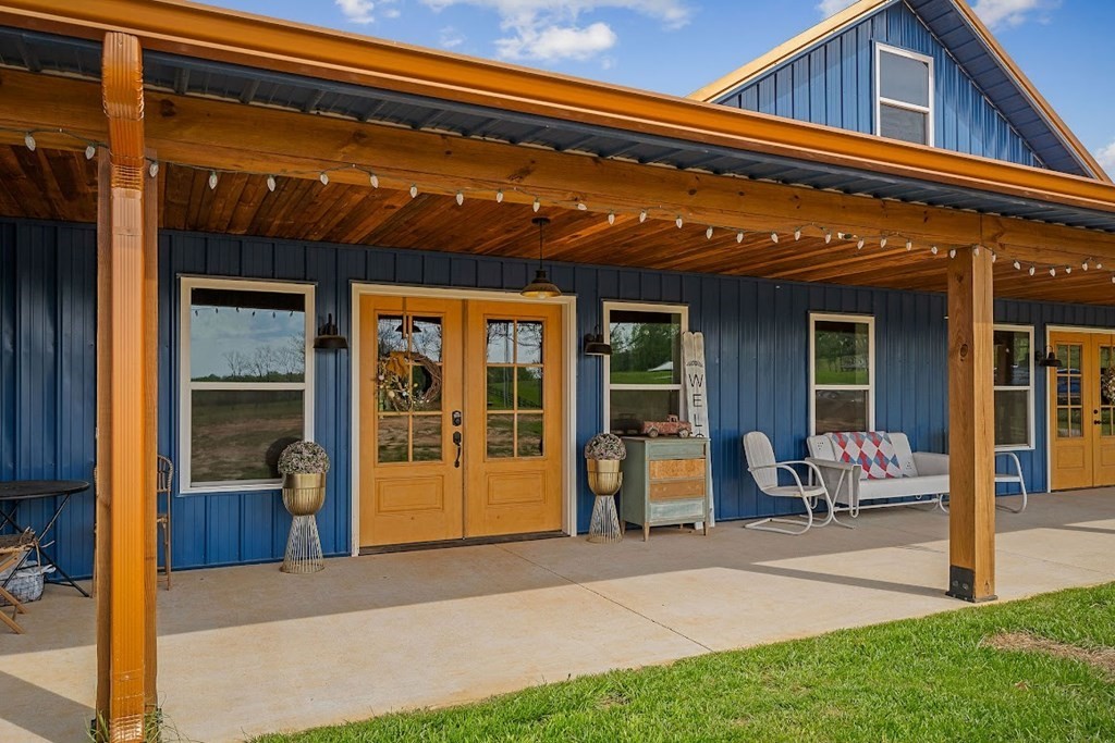 240 Bob Ledbetter Road Livingston, TN 38570 - Photo 4 of 62 a view of a building with sitting area
