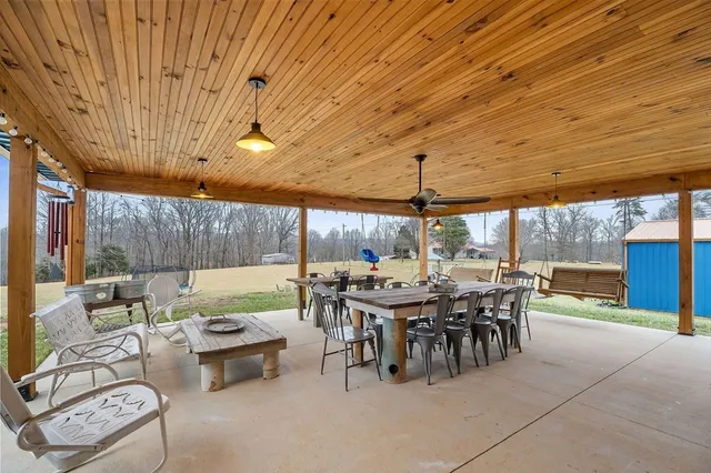 a backyard of a house with lots of green space