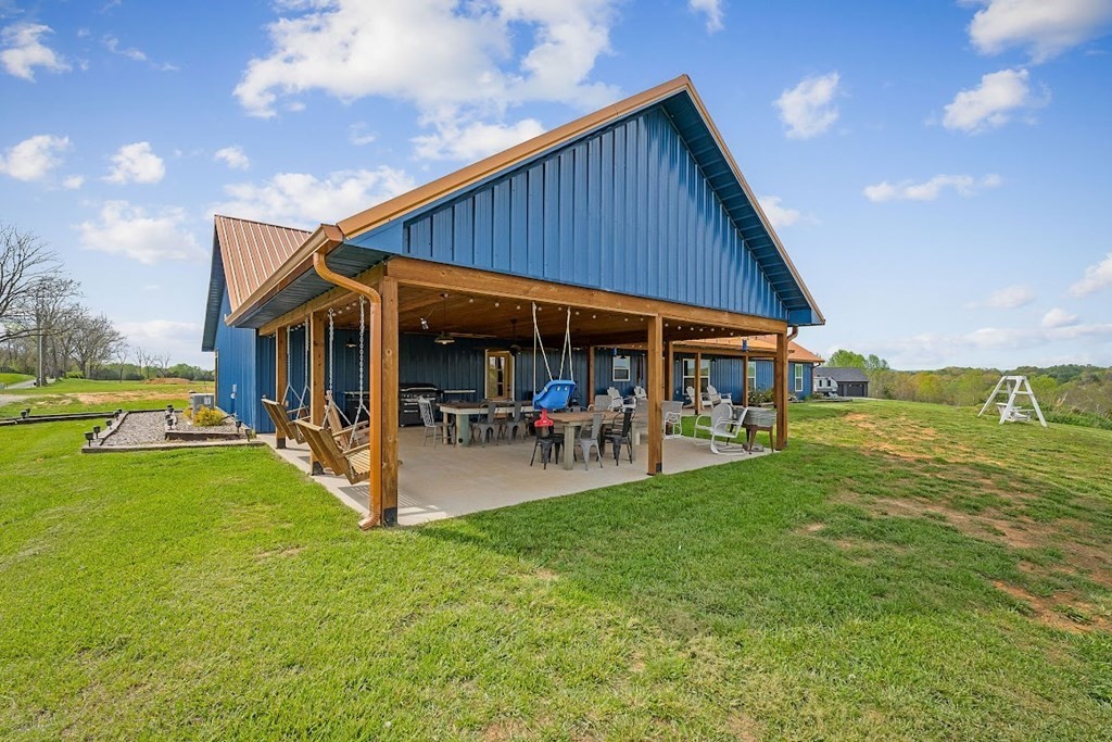 240 Bob Ledbetter Road Livingston, TN 38570 - Photo 52 of 62 a view of a house with a yard patio and swimming pool