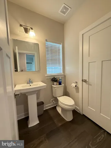 a bathroom with a sink and a toilet