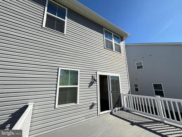 a view of a house with a deck