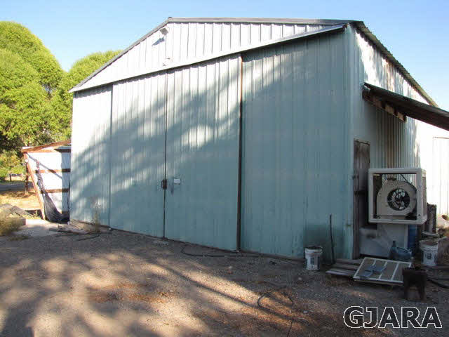 998 21 Road Grand Junction, CO 81505 - Photo 22 of 26 a view of a house with a street