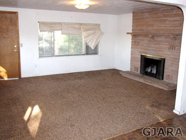 998 21 Road Grand Junction, CO 81505 - Photo 3 of 26 a view of an empty room with a window