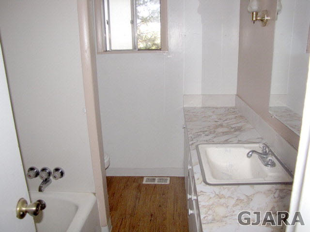 998 21 Road Grand Junction, CO 81505 - Photo 8 of 26 a bathroom with a bathtub