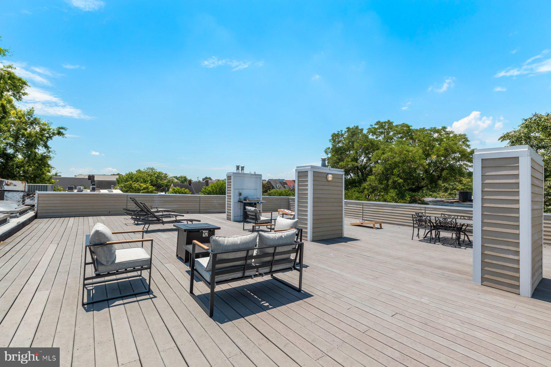 207 South Patrick Street, Unit 104 Alexandria, VA 22314 - Photo 25 of 33 a view of roof deck with patio