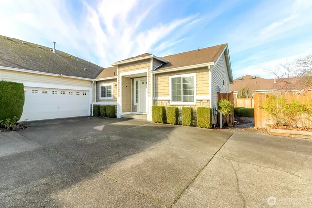 a view of a house with a street