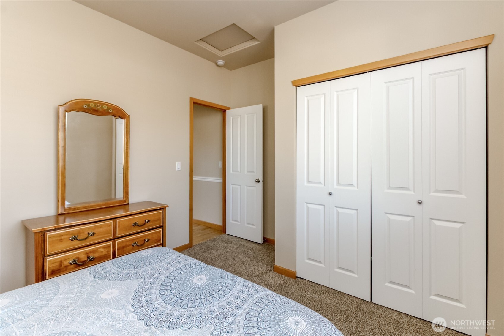 1113 O'Farrell Lane Northwest Orting, WA 98360 - Photo 19 of 36 a living room with furniture and a wooden floor