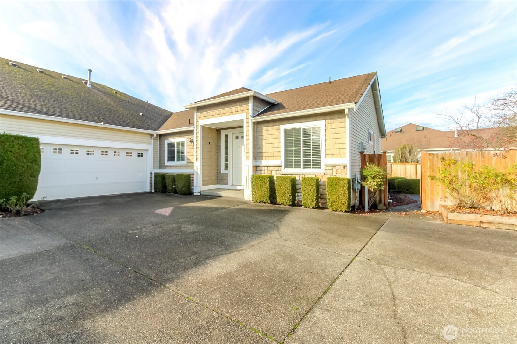 1113 O'Farrell Lane Northwest Orting, WA 98360 - Photo 2 of 36 a view of a house with a street