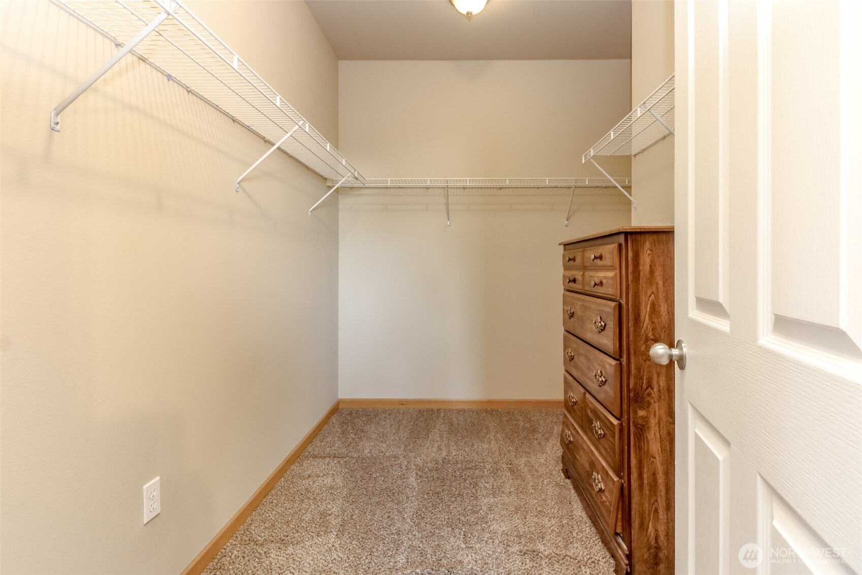 1113 O'Farrell Lane Northwest Orting, WA 98360 - Photo 25 of 36 a view of walk in closet with empty racks