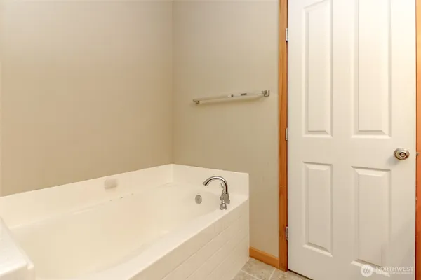 a view of a storage & utility room with a washer dryer