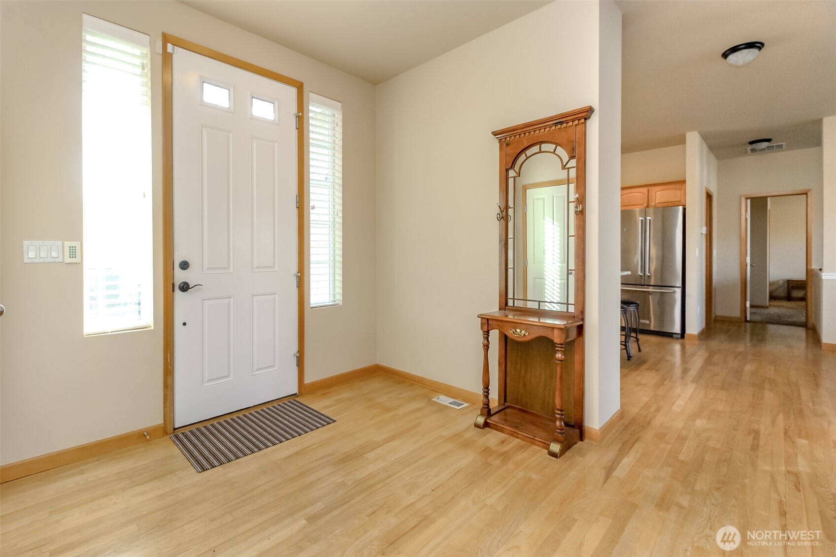 1113 O'Farrell Lane Northwest Orting, WA 98360 - Photo 6 of 36 wooden floor and windows in a room