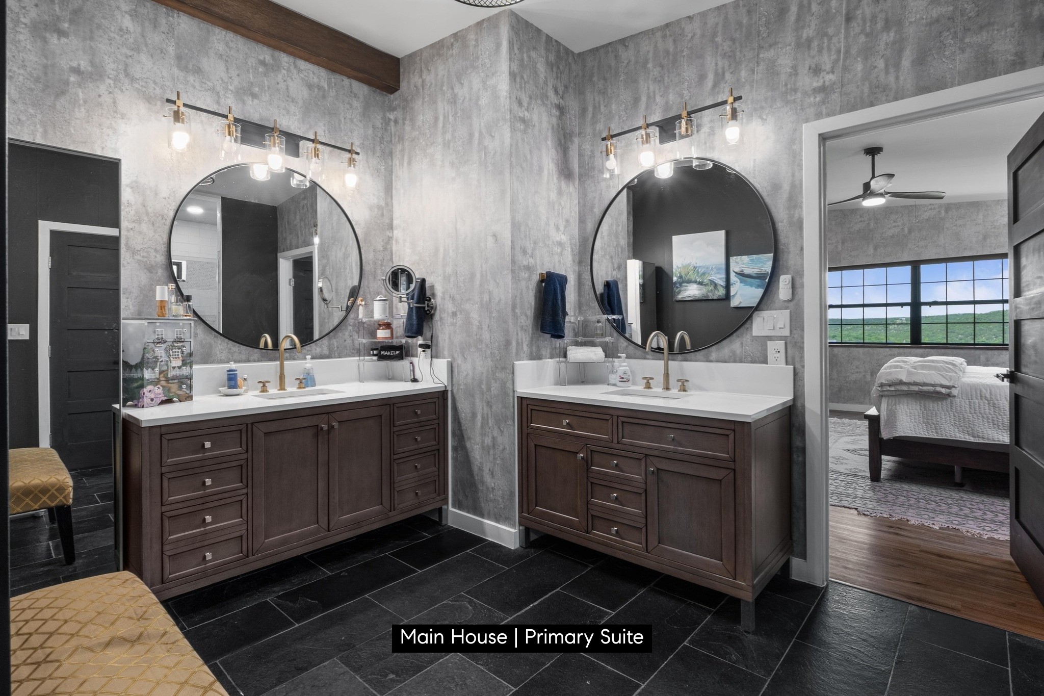 11104 Trails End Road Leander, TX 78641 - Photo 11 of 40 a bathroom with a double vanity sink and a mirror