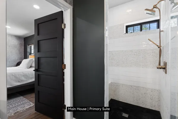 a bedroom with a bed and a walk in closet