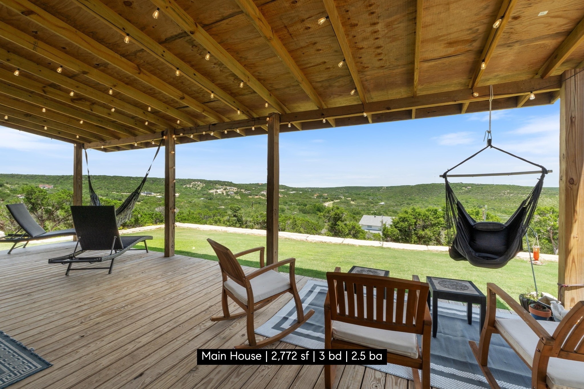 11104 Trails End Road Leander, TX 78641 - Photo 18 of 40 a view of chairs and table in patio with a yard