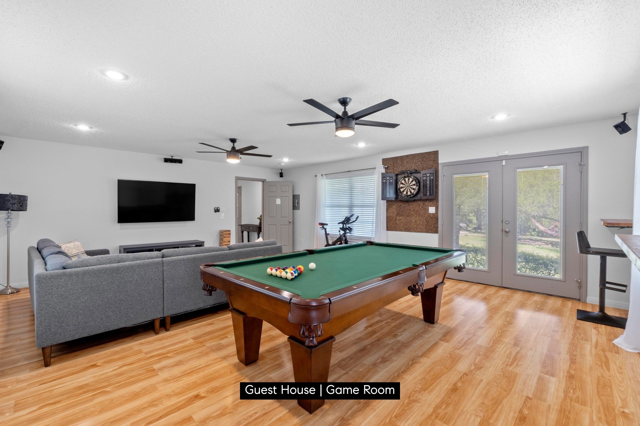 11104 Trails End Road Leander, TX 78641 - Photo 26 of 40 a living room with furniture pool table and a flat screen tv