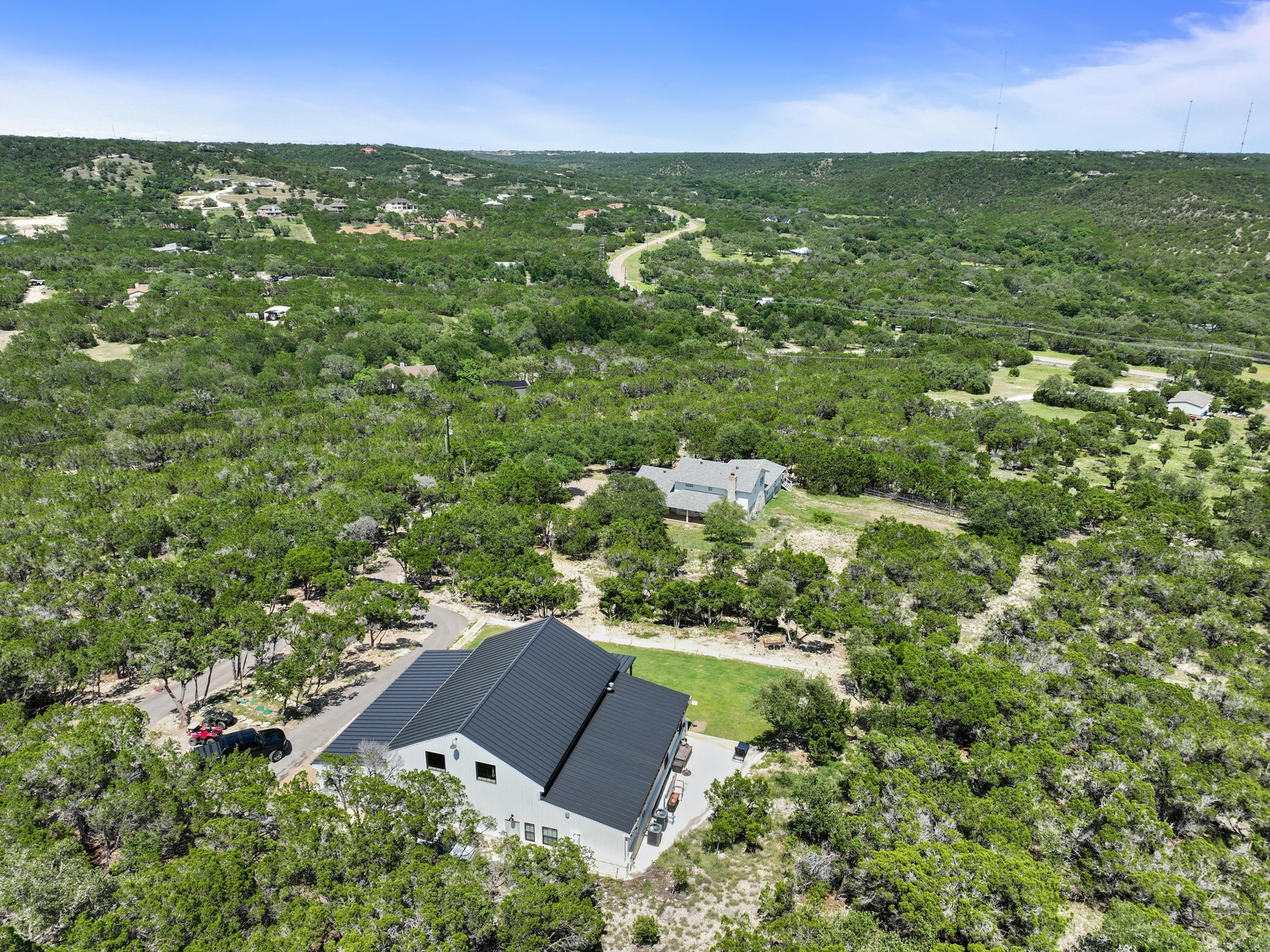 11104 Trails End Road Leander, TX 78641 - Photo 38 of 40 an aerial view of residential houses with outdoor space and trees
