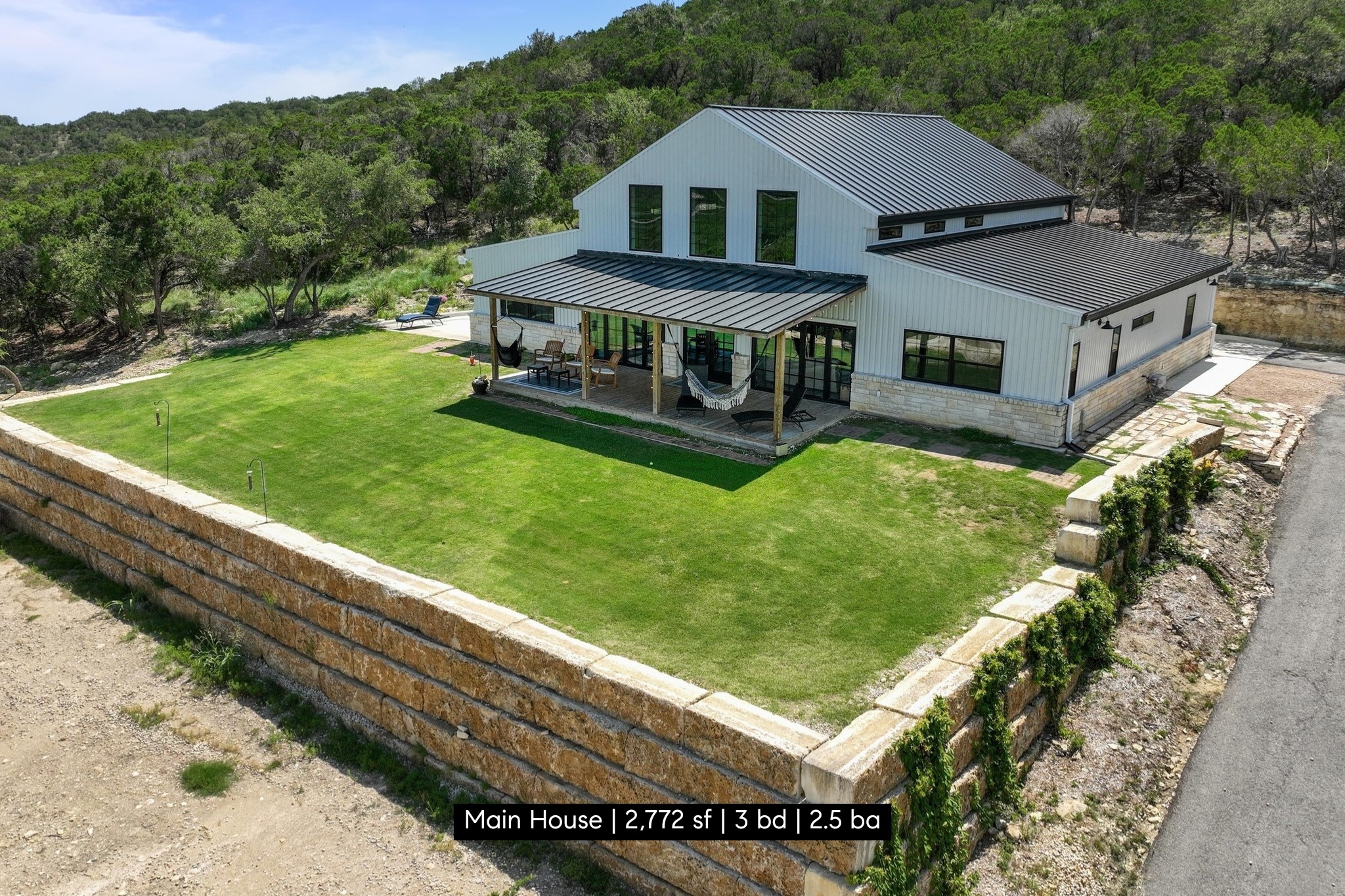 11104 Trails End Road Leander, TX 78641 - Photo 5 of 40 a aerial view of a house with a yard table and chairs