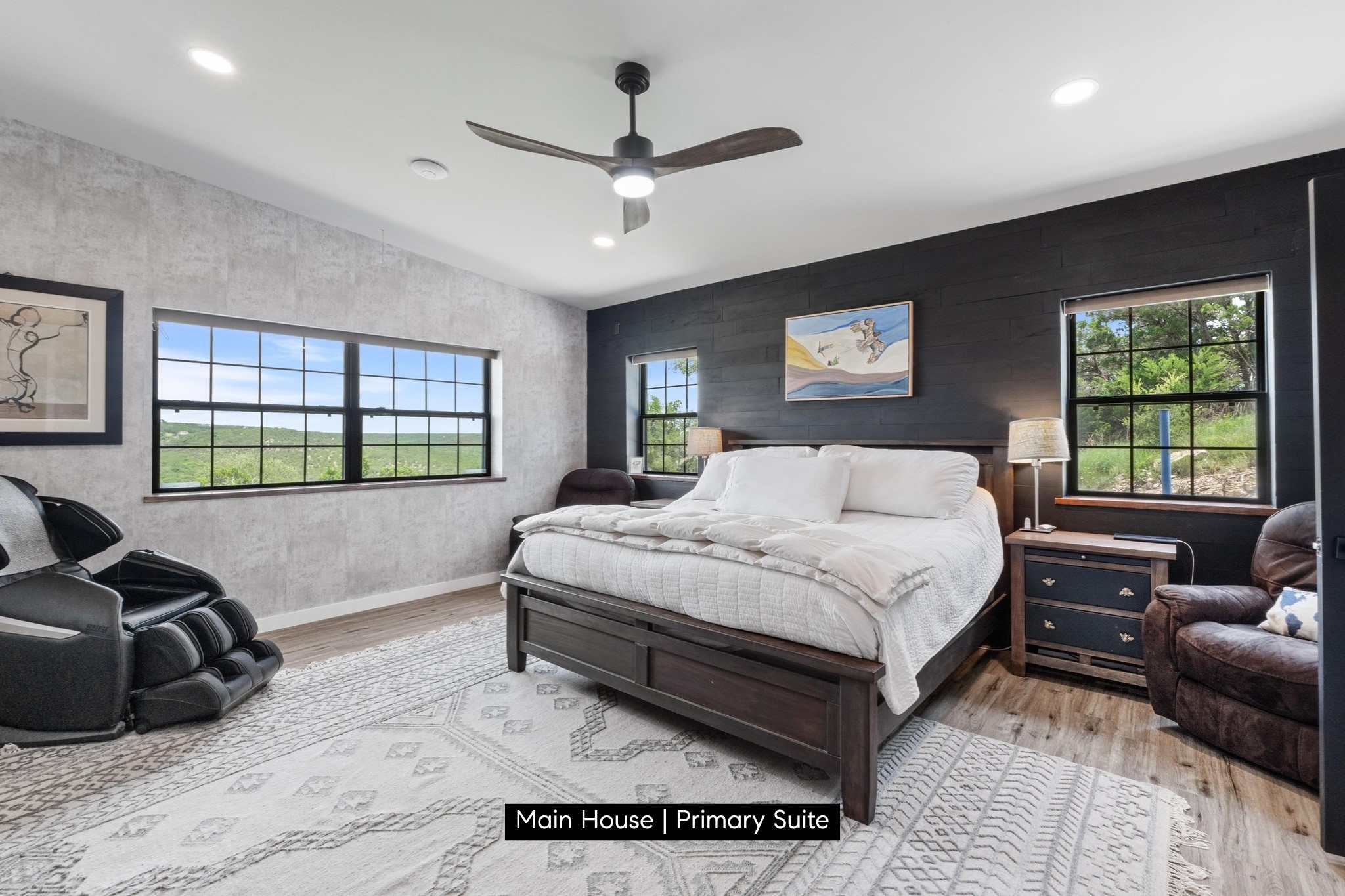 11104 Trails End Road Leander, TX 78641 - Photo 10 of 40 a spacious bedroom with a bed window and couch