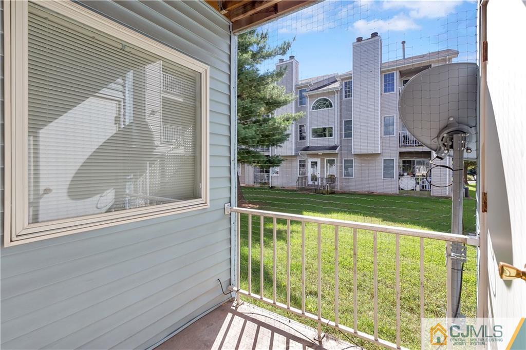 810 Edpas Road, Unit 810 New Brunswick, NJ 08901 - Photo 14 of 15 a view of a house with a swimming pool