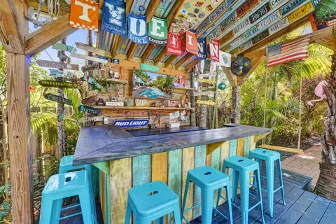 a view of a chairs and table in the patio