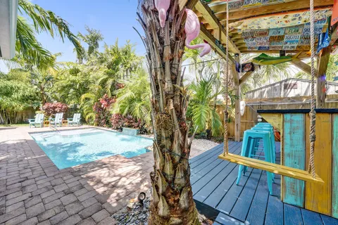 a pathway of a house with a yard