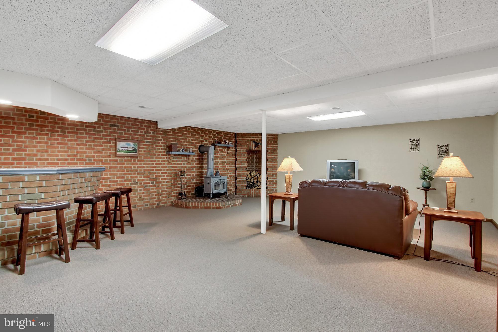2712 Garrett Road White Hall, MD 21161 - Photo 22 of 48 Lower level w/bar and wood stove