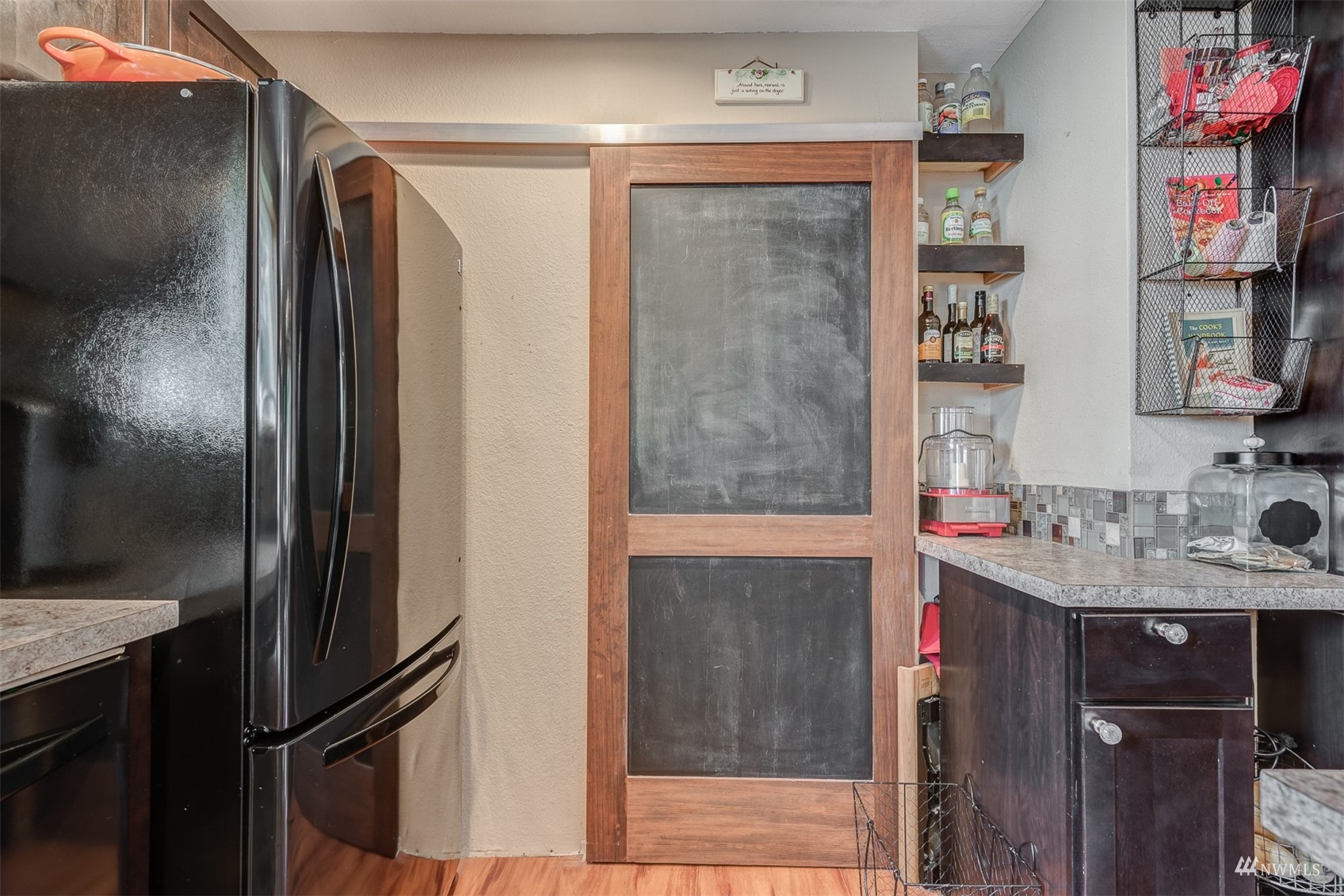 1825 225th Street Southeast Bothell, WA 98021 - Photo 12 of 30 a bathroom with a sink vanity and a mirror