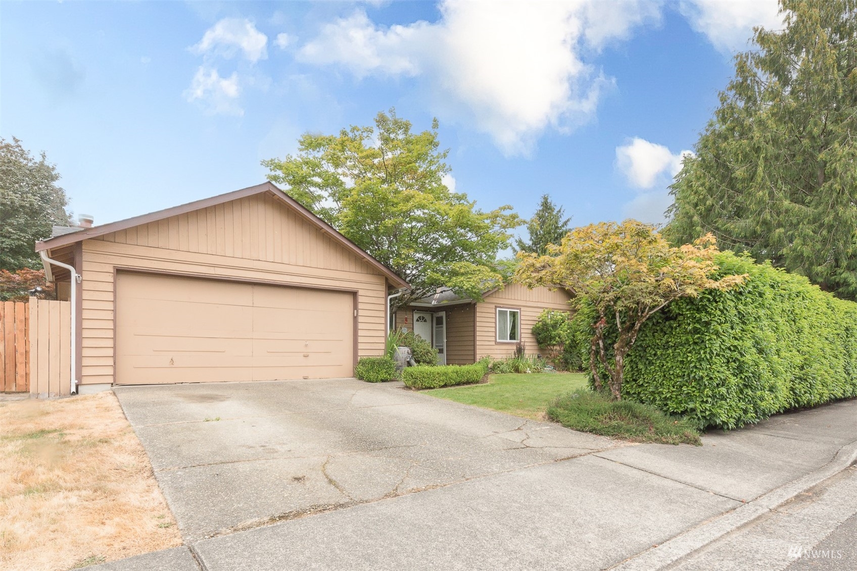 1825 225th Street Southeast Bothell, WA 98021 - Photo 3 of 30 a house with a yard