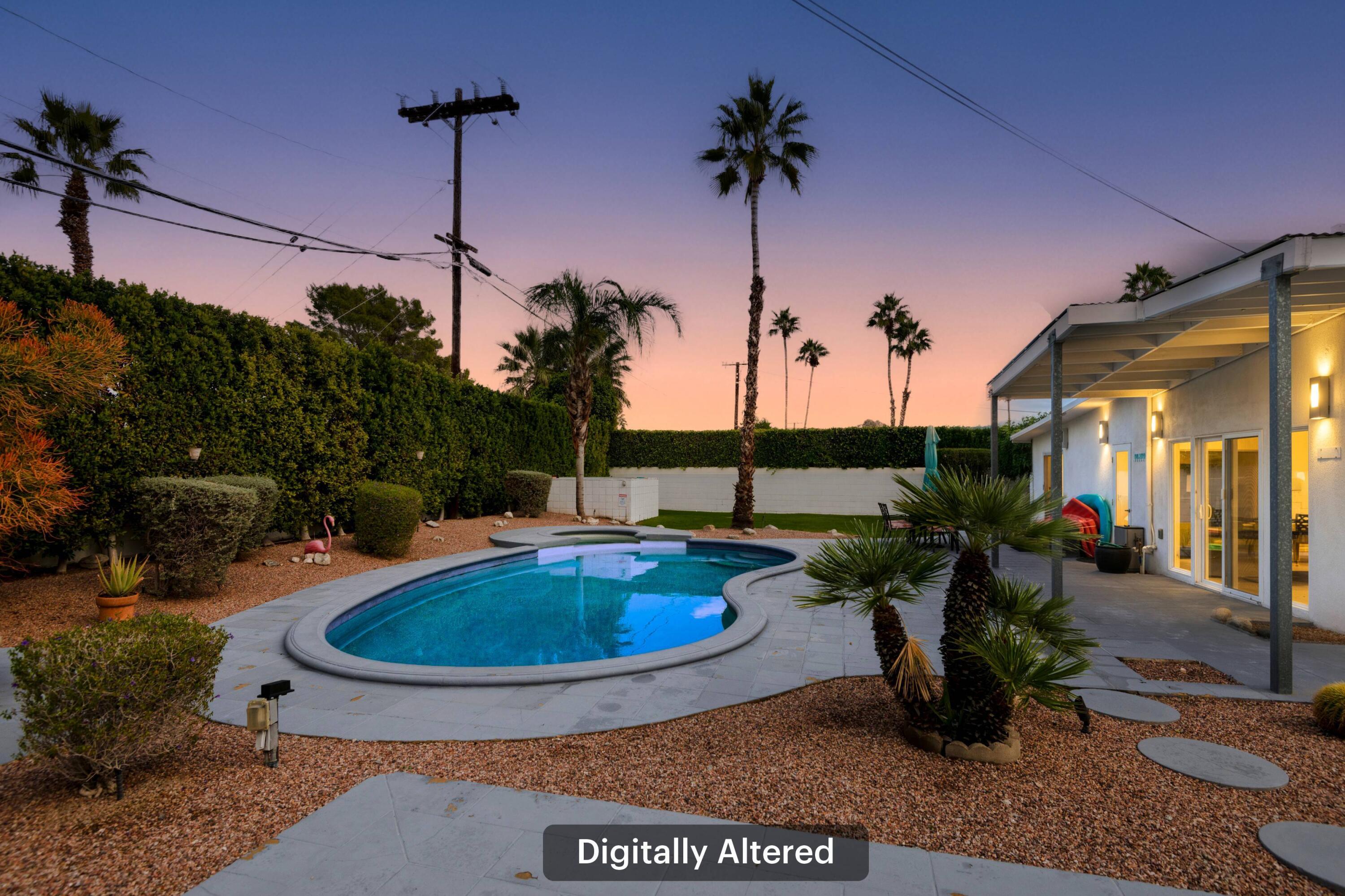302 East Racquet Club Road Palm Springs, CA 92262 - Photo 30 of 38 a view of a backyard with plants and patio