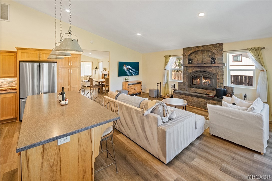 435 Wagon Wheel Road Big Bear City, CA 92314 - Photo 15 of 50 a living room with furniture and a chandelier