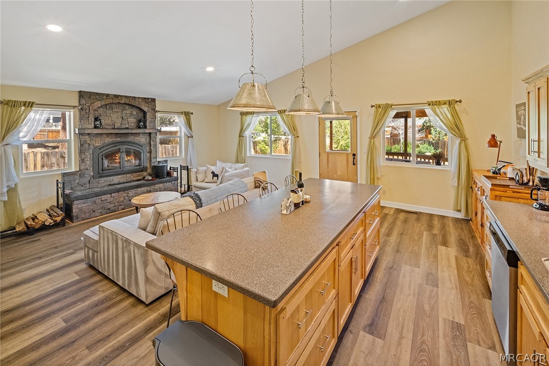 435 Wagon Wheel Road Big Bear City, CA 92314 - Photo 21 of 50 a living room with furniture stove and wooden floor