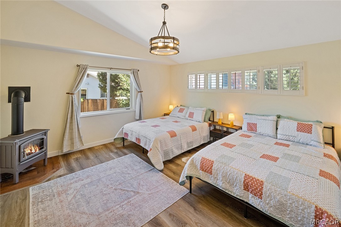 435 Wagon Wheel Road Big Bear City, CA 92314 - Photo 25 of 50 a bedroom with two beds and a window