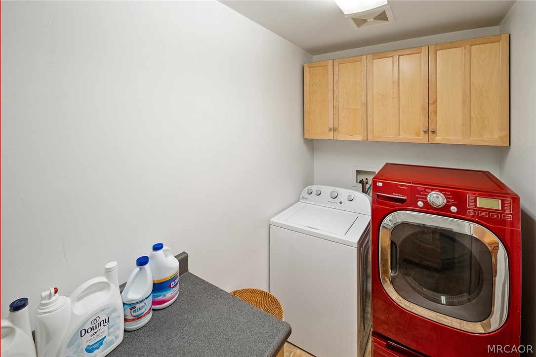 435 Wagon Wheel Road Big Bear City, CA 92314 - Photo 40 of 50 a utility room with dryer and washer
