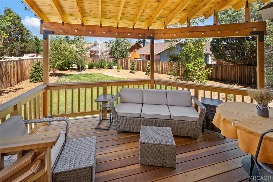 435 Wagon Wheel Road Big Bear City, CA 92314 - Photo 42 of 50 a view of a chairs on a deck