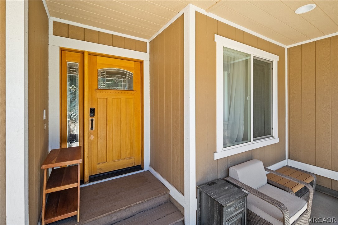 435 Wagon Wheel Road Big Bear City, CA 92314 - Photo 6 of 50 a view of front door and wooden floor