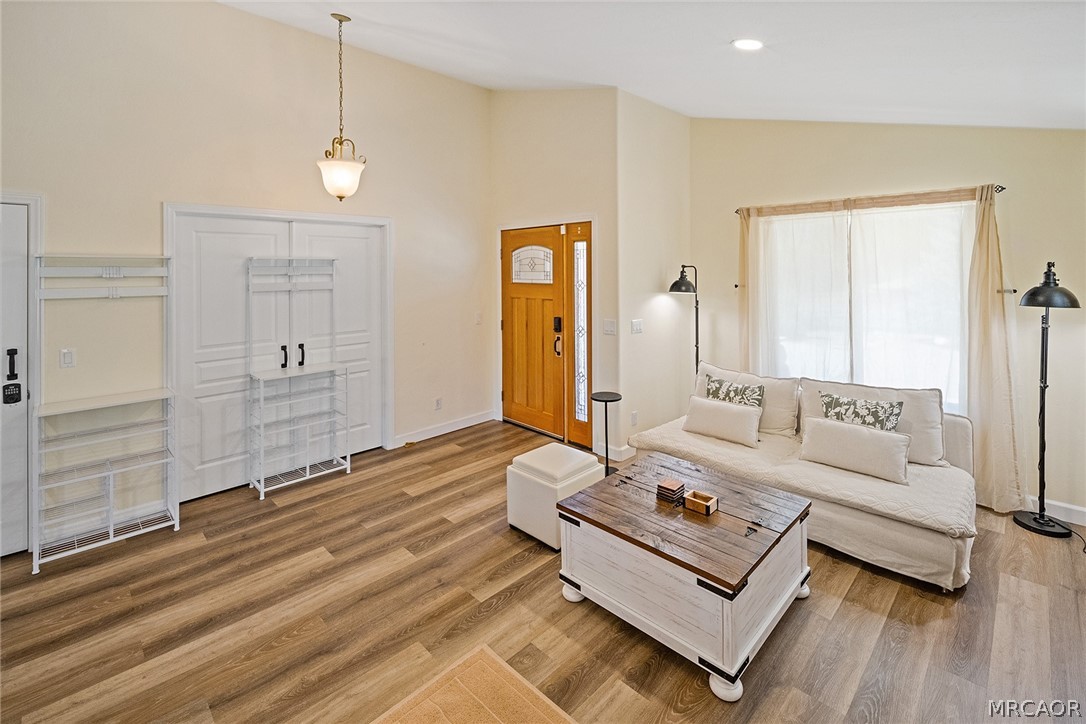 435 Wagon Wheel Road Big Bear City, CA 92314 - Photo 8 of 50 a living room with furniture and wooden floor