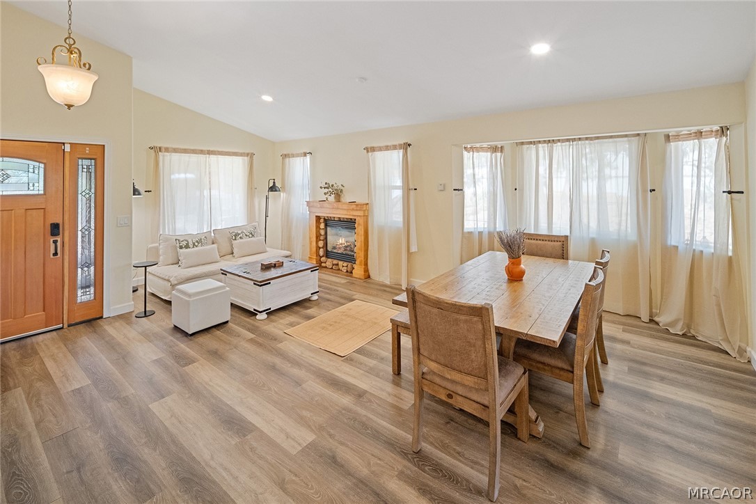 435 Wagon Wheel Road Big Bear City, CA 92314 - Photo 10 of 50 a living room with furniture and a chandelier