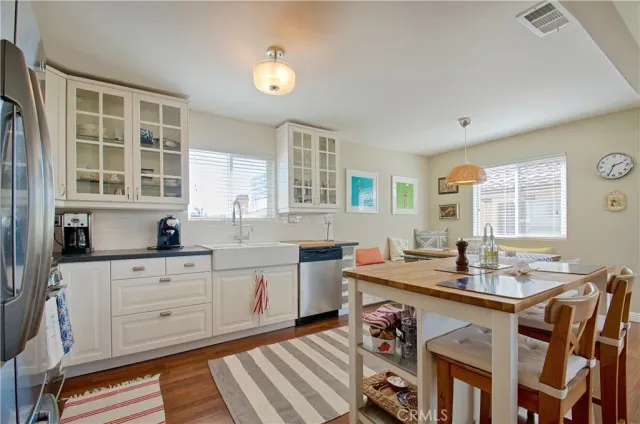 a bed room with furniture and a flat screen tv