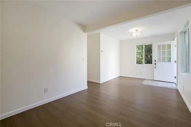 a bathroom with a granite countertop sink mirror and double