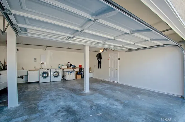 a utility room with washer and dryer