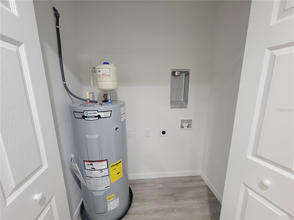 3150 Southwest 96th Place, Unit 1 Ocala, FL 34476 - Photo 5 of 8 a bathroom with a toilet and a shower curtain