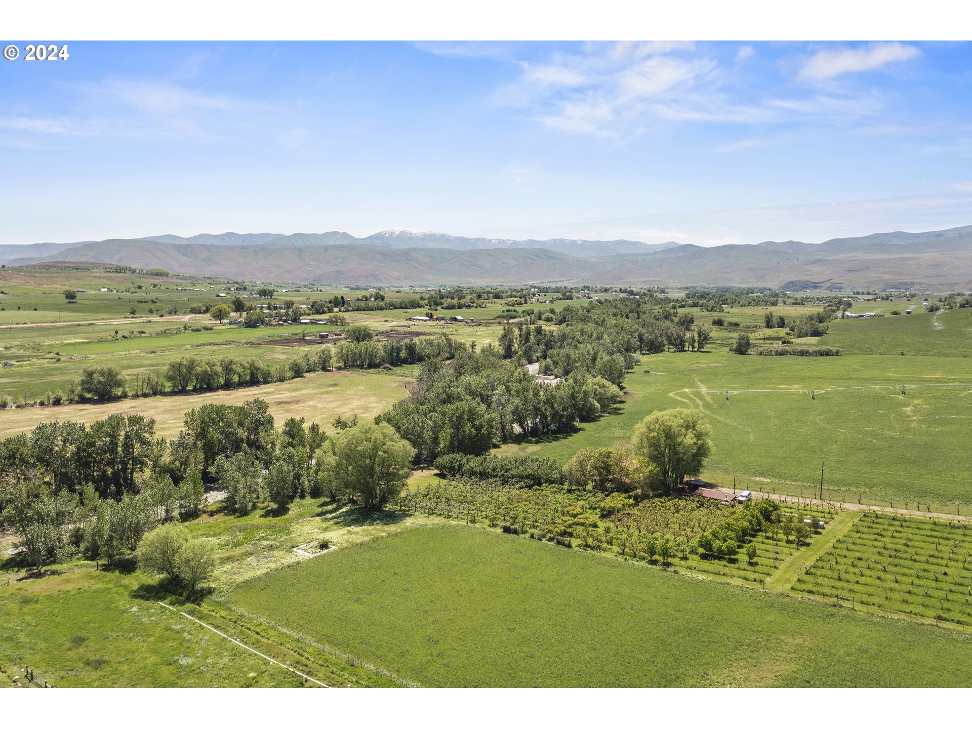 43479 Old Foothill Road Richland, OR 97870 - Photo 1 of 44 a view of a lake with a mountain