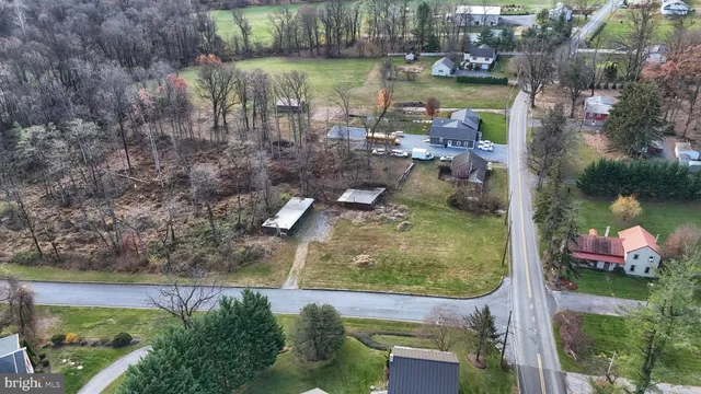 a view of a lake in between two of trees