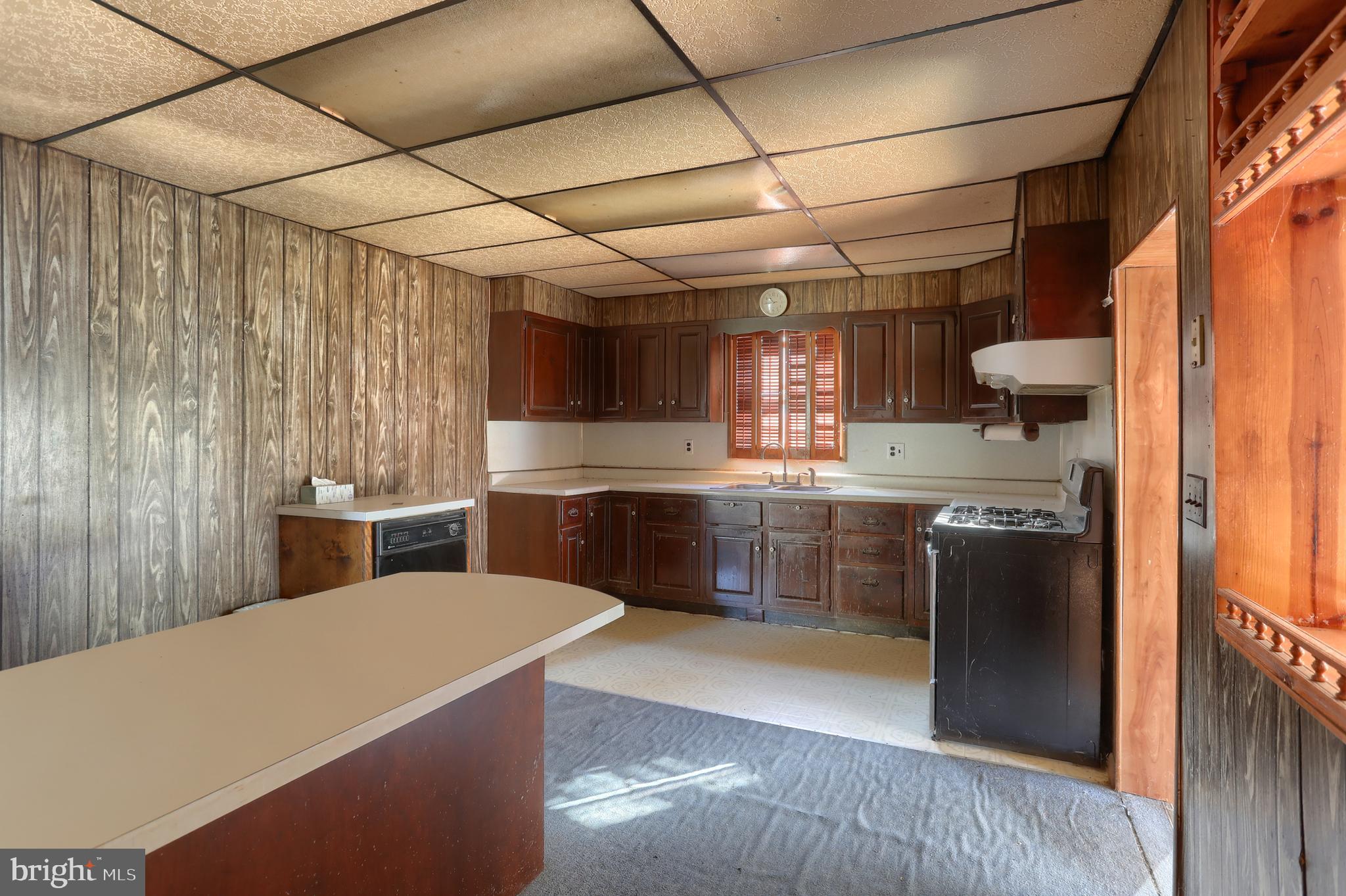 433 Sheep Hill Road Newmanstown, PA 17073 - Photo 19 of 35 a kitchen with stainless steel appliances granite countertop a sink a stove and a refrigerator