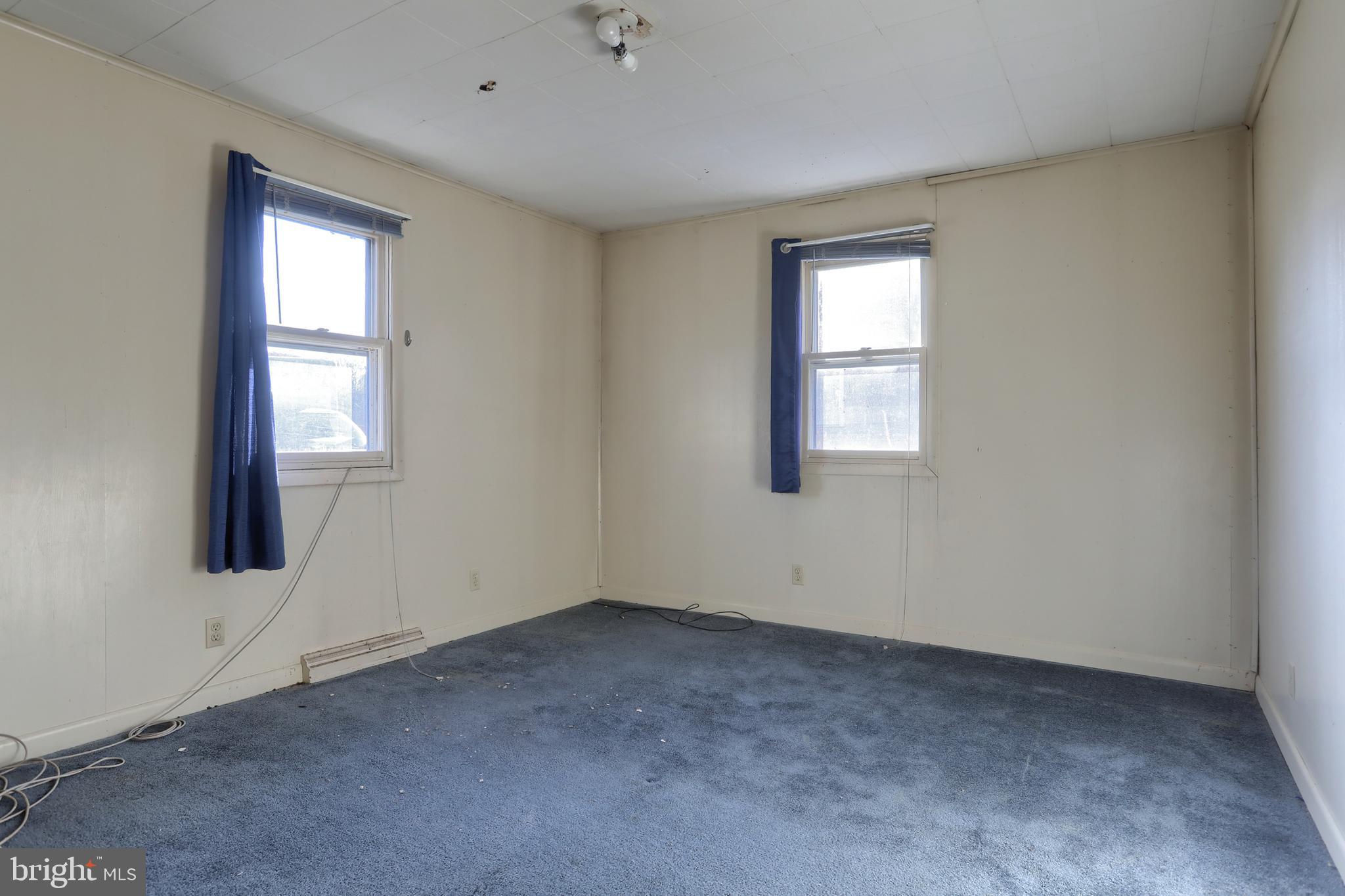 433 Sheep Hill Road Newmanstown, PA 17073 - Photo 21 of 35 an empty room with windows