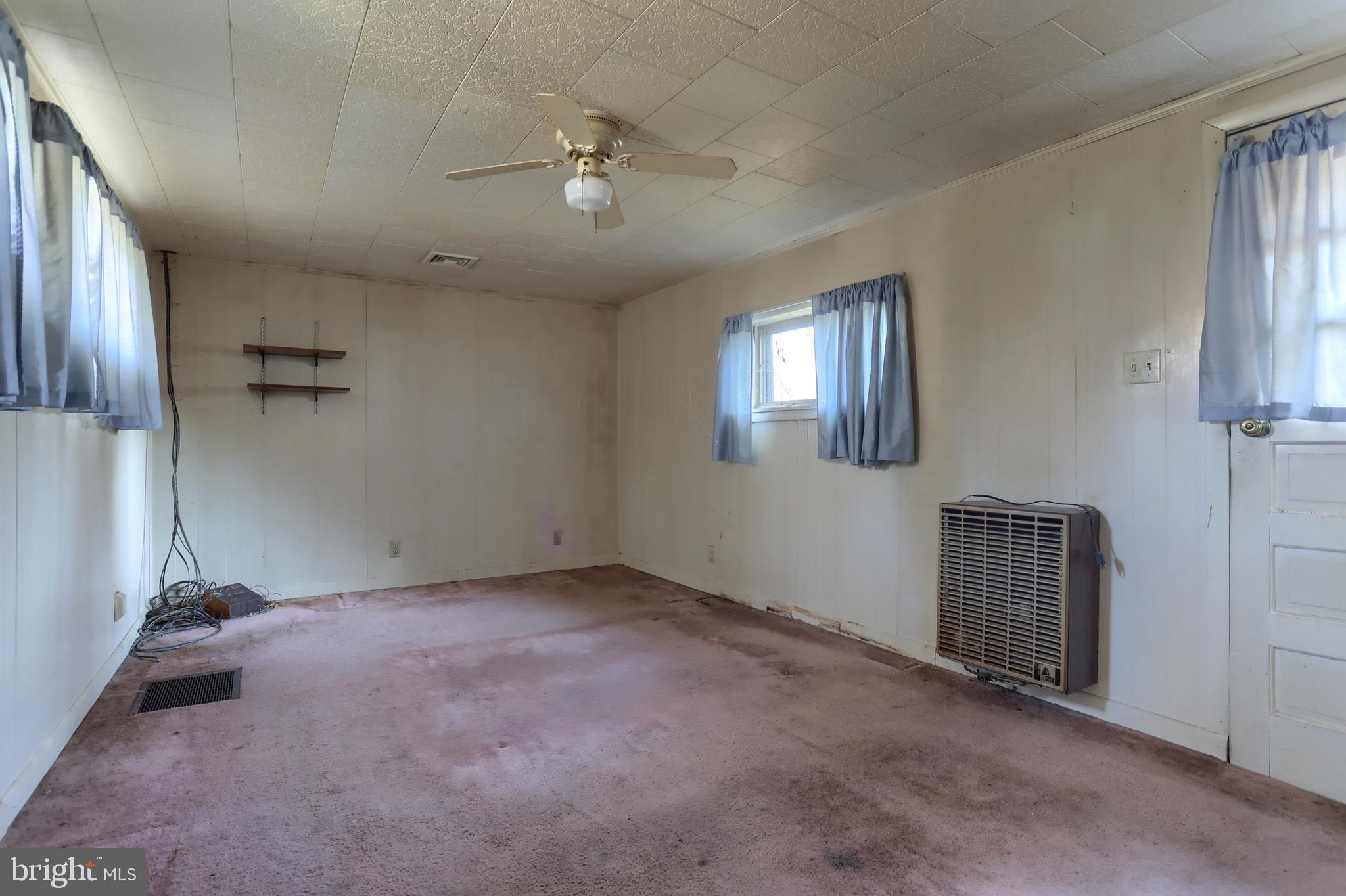 433 Sheep Hill Road Newmanstown, PA 17073 - Photo 23 of 35 an empty room with windows