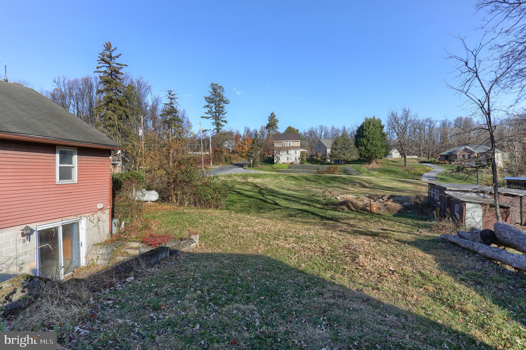 433 Sheep Hill Road Newmanstown, PA 17073 - Photo 26 of 35 a view of a backyard with large trees